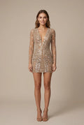 Bodycon mini dress featuring a deep V-neckline and sheer sequin sleeves, perfect for a stylish evening look. 0