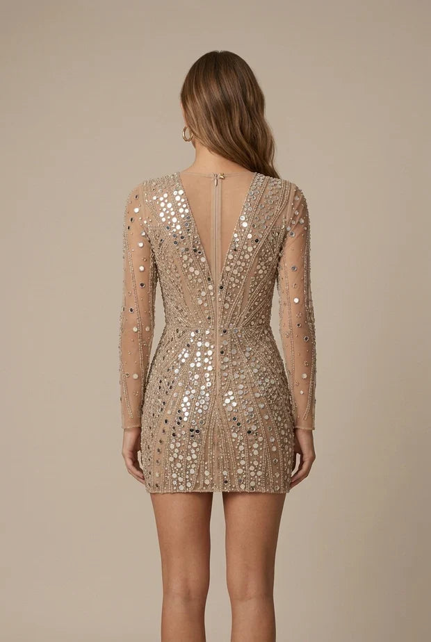 Bodycon mini dress featuring a deep V-neckline and sheer sequin sleeves, perfect for a stylish evening look. 2