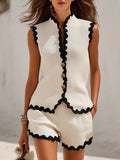 Chic two piece set featuring a sleeveless vest and mini shorts with scalloped trim, perfect for summer outings and casual gatherings. 0