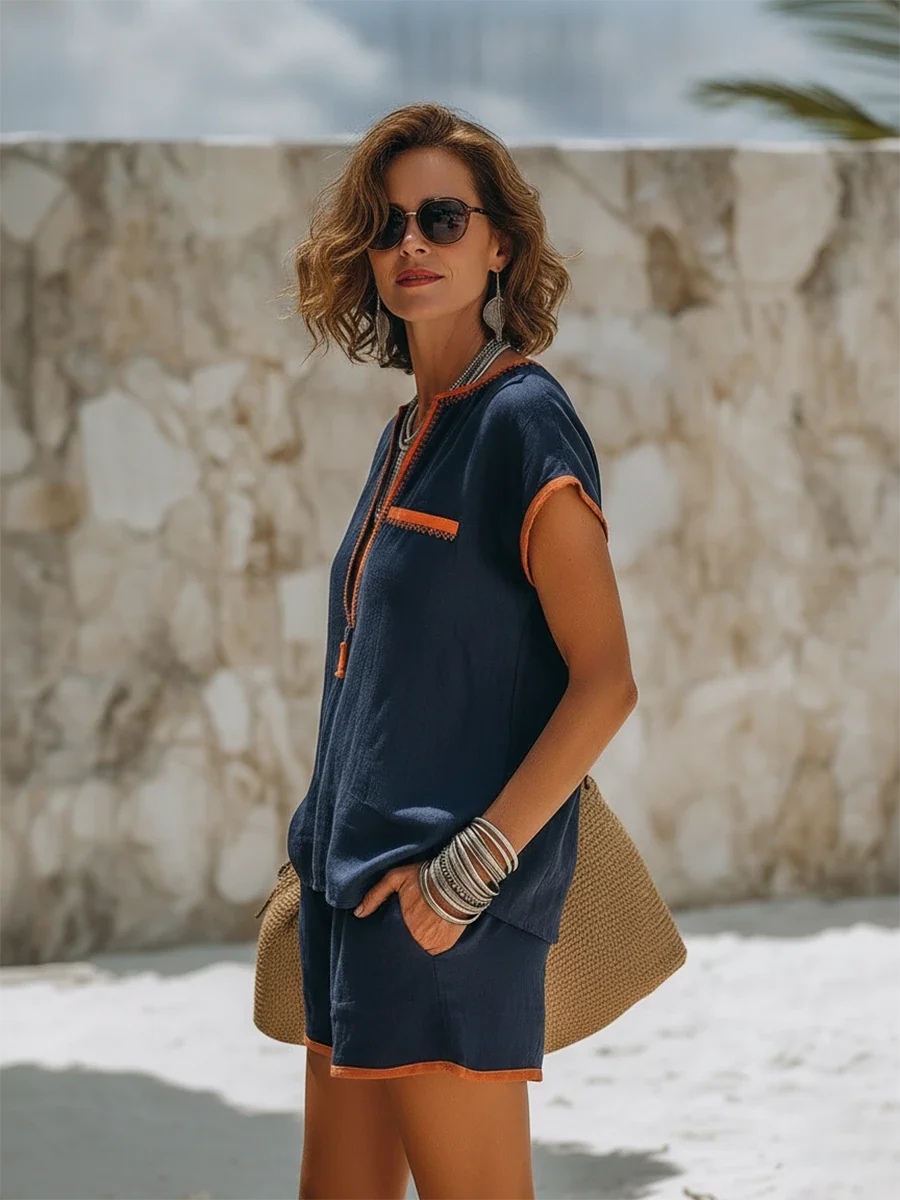 Lightweight cotton-linen two-piece women's shorts set featuring a stylish zip-front top, perfect for summer outings and casual wear. 2