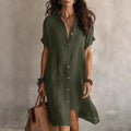Lightweight white midi dress featuring a button-down front and a relaxed fit, perfect for casual summer outings. 0