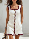 Sleeveless mini dress for women featuring a square neck design and scalloped trim, perfect for stylish summer outings. 0