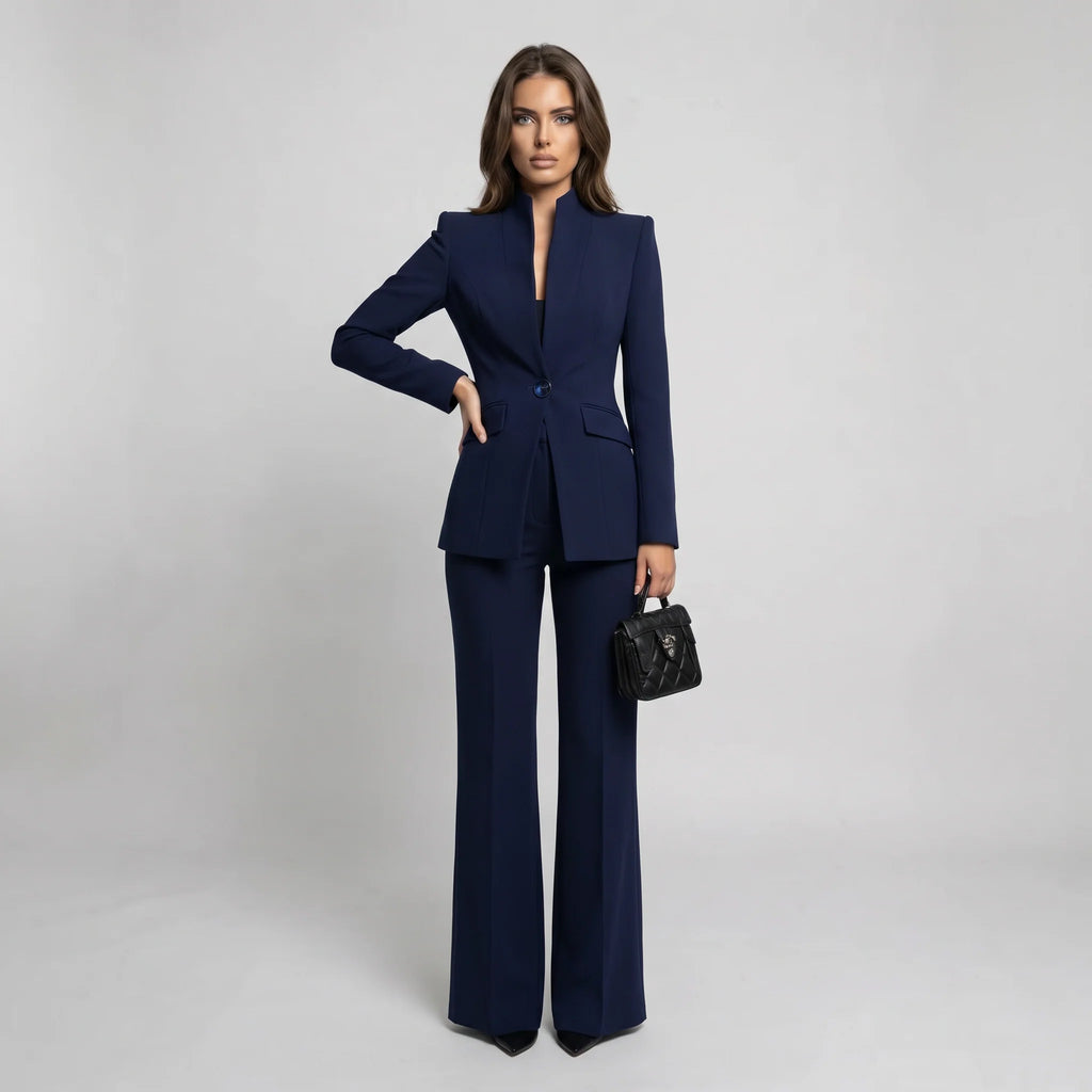 Tailored women's suit set featuring a stylish high collar blazer and elegant wide-leg trousers, perfect for professional and formal occasions. 2