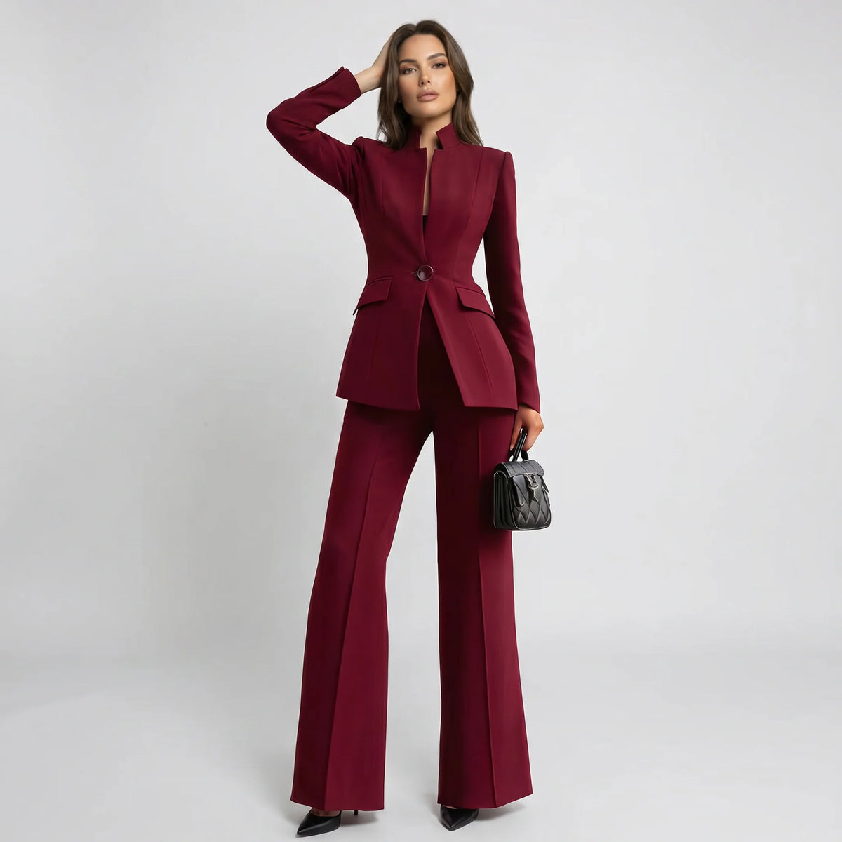 Tailored women's suit set featuring a stylish high collar blazer and elegant wide-leg trousers, perfect for professional and formal occasions. 6
