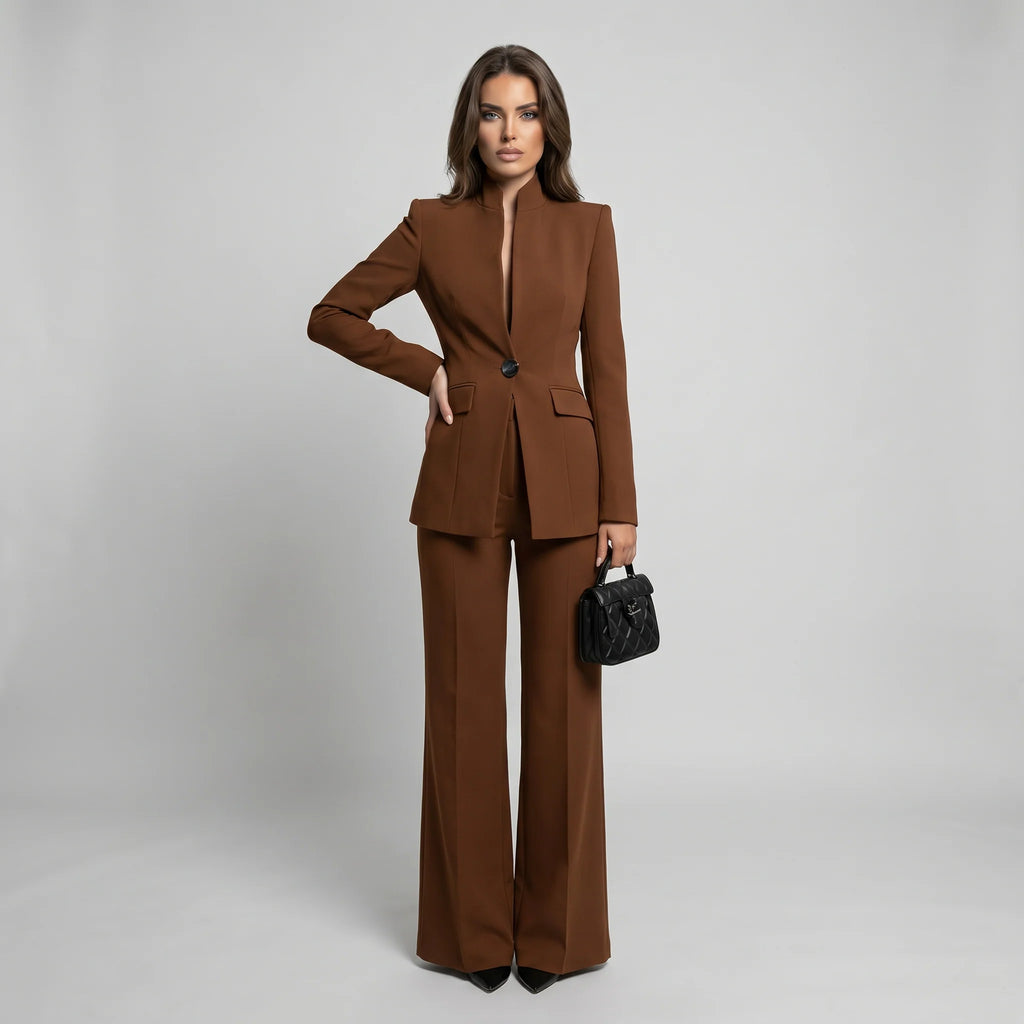 Tailored women's suit set featuring a stylish high collar blazer and elegant wide-leg trousers, perfect for professional and formal occasions. 8