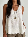 White floral embroidered women's tank top featuring a delicate scalloped hem, perfect for a stylish summer look. 0